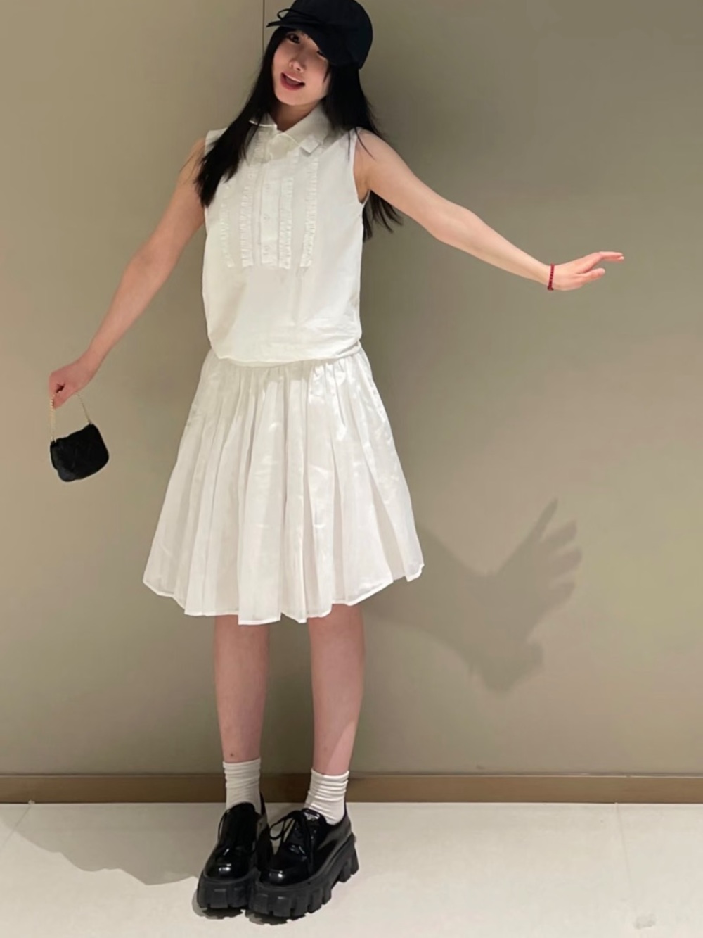 Yoon Cream Sleeveless Ruffle-Front Collared Top - Picture 2 of 6